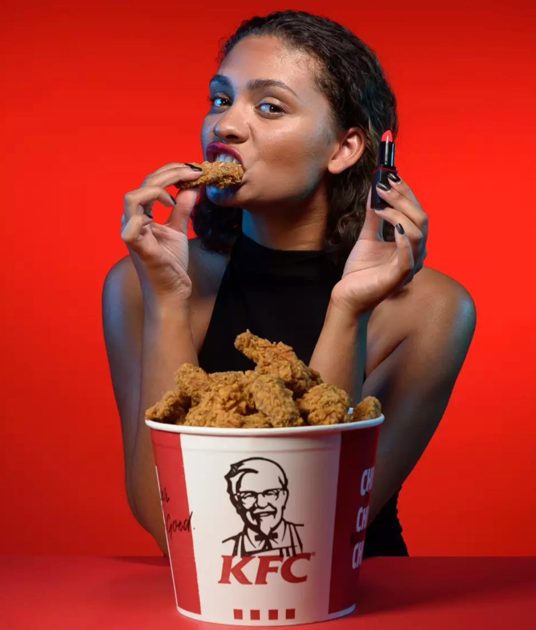 KFC has just launched a &#8216;bucket red&#8217; lipstick that tastes like hot wings, The Manc