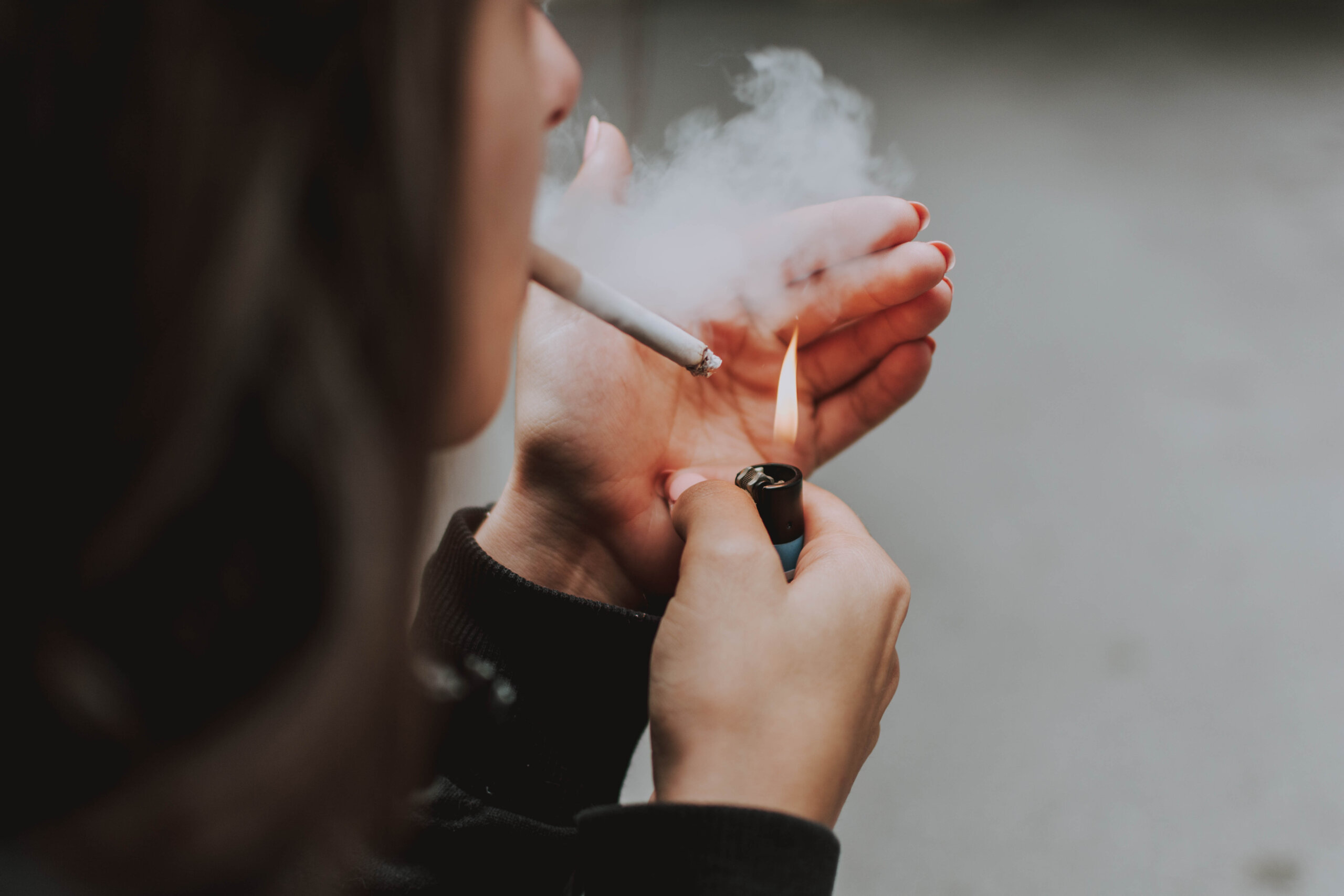 Person smoking a cigarette