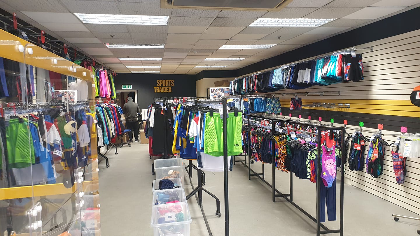 A charity shop stocked full of sportswear is opening at Salford