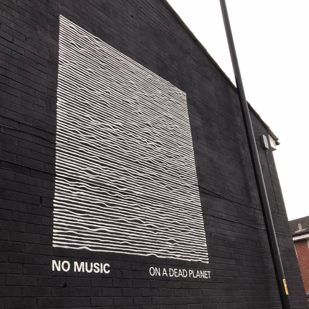 A new Joy Division mural recreating iconic album artwork has been unveiled in Withington, The Manc