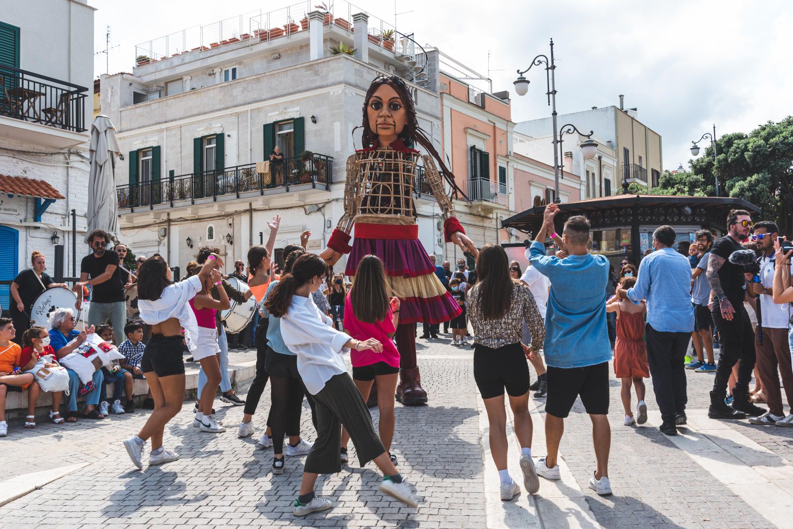 A photo of Little Amal, an 11-foot puppet coming to Manchester this November.