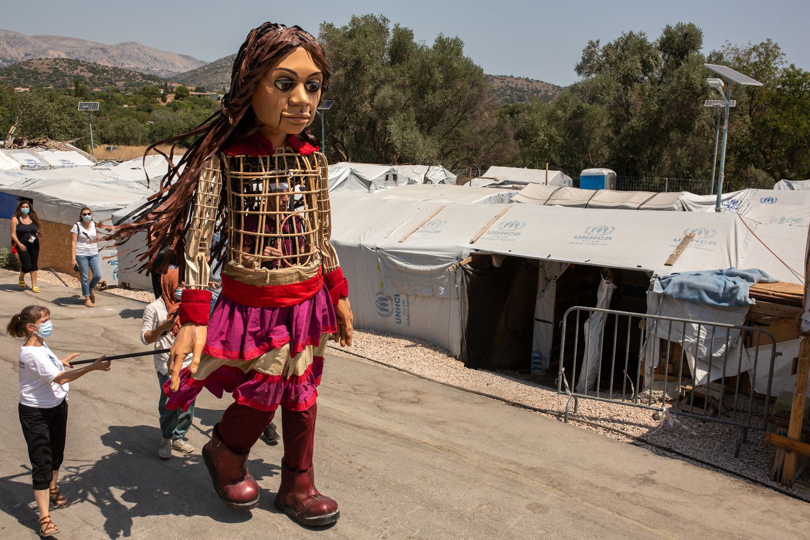 A photo of Little Amal, a 3.5 metre puppet who is coming to Manchester