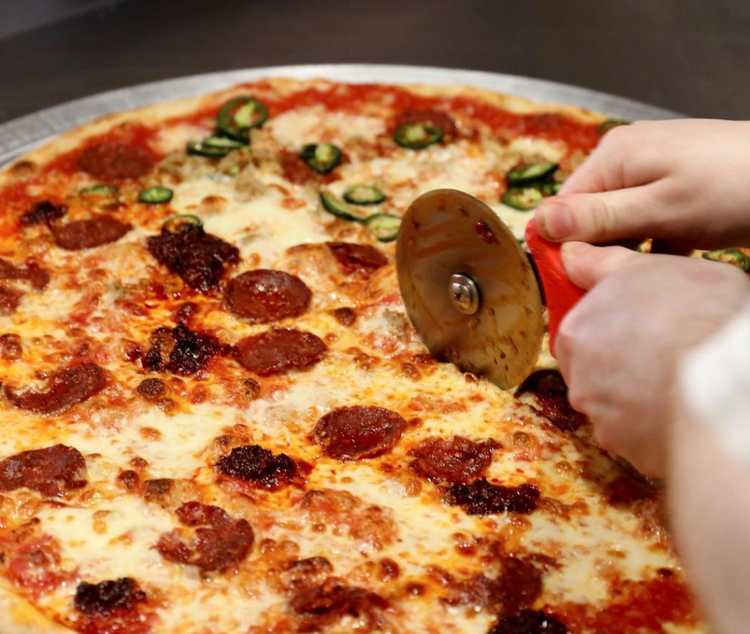 Nell&#8217;s is bringing its famous 22&#8243; pizza slices to KAMPUS next month, The Manc