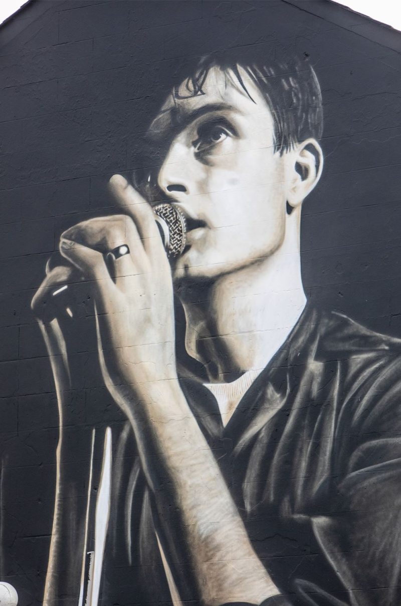 New mural of Joy Division icon Ian Curtis unveiled in his hometown, The Manc