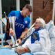 Stockport County surprises long-time fan with promotion title trophy in hospice, The Manc