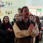 Cian Ducrot surprising people with choir in Manchester