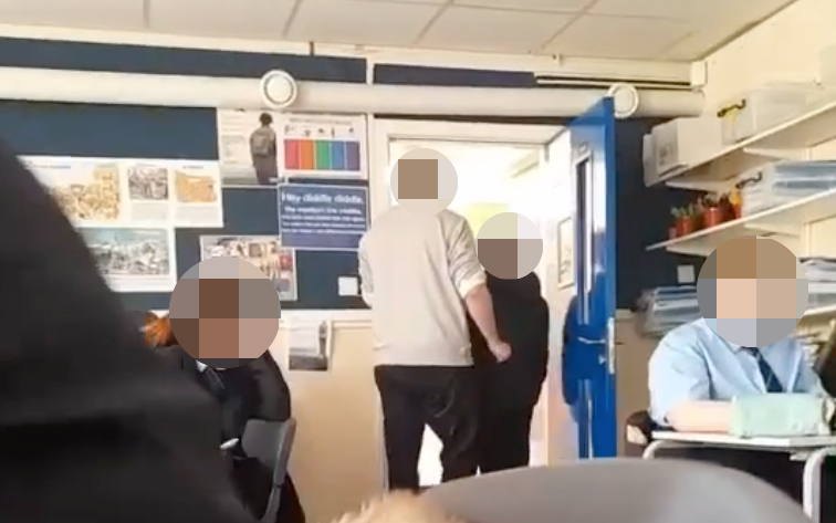 Stockport teacher throws student to the floor