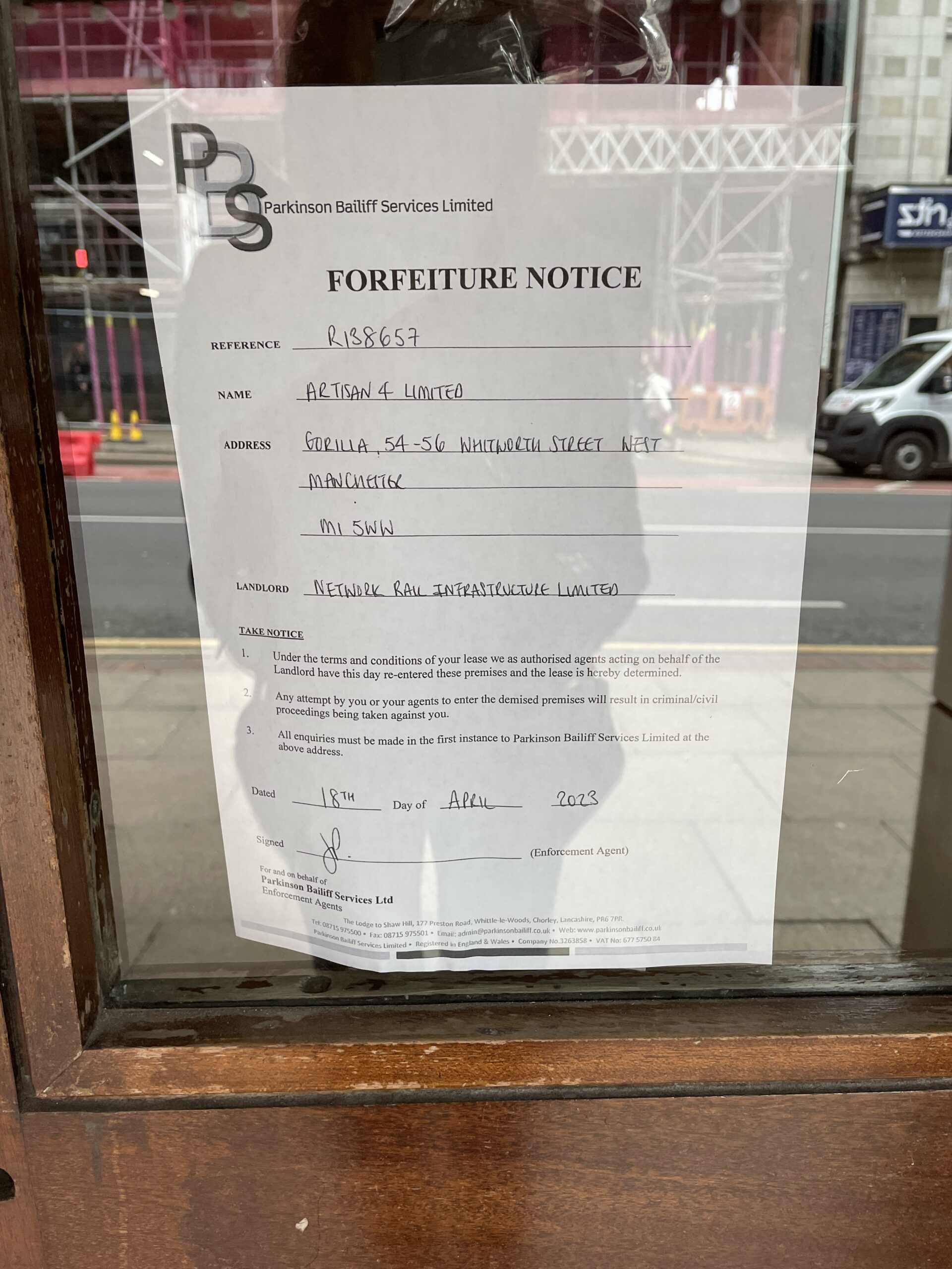 Notices in the window of Gorilla in Manchester