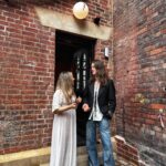 Tom and Katie Ogden outside Bohemian Arts Club in Stockport