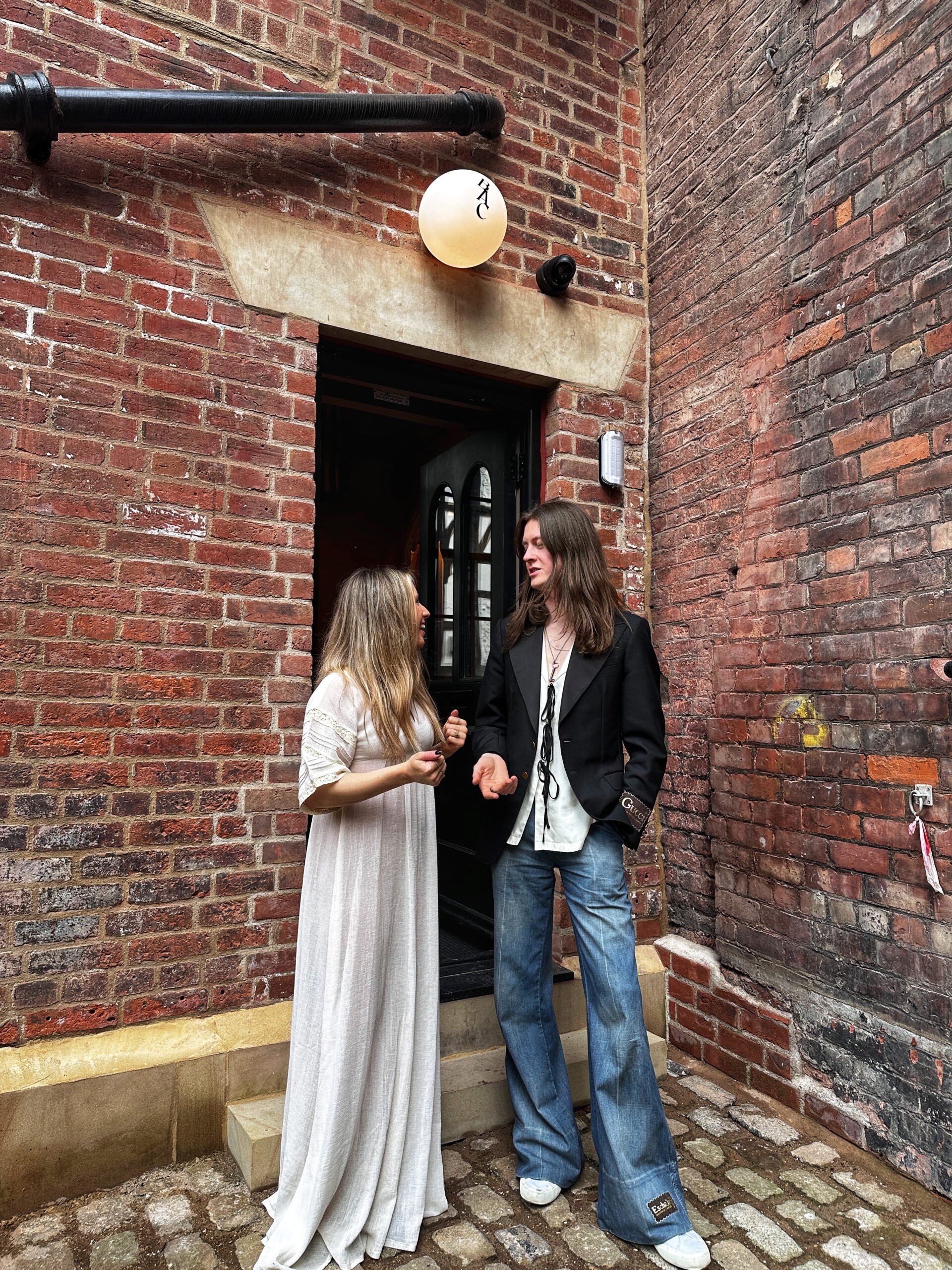Tom and Katie Ogden outside Bohemian Arts Club in Stockport