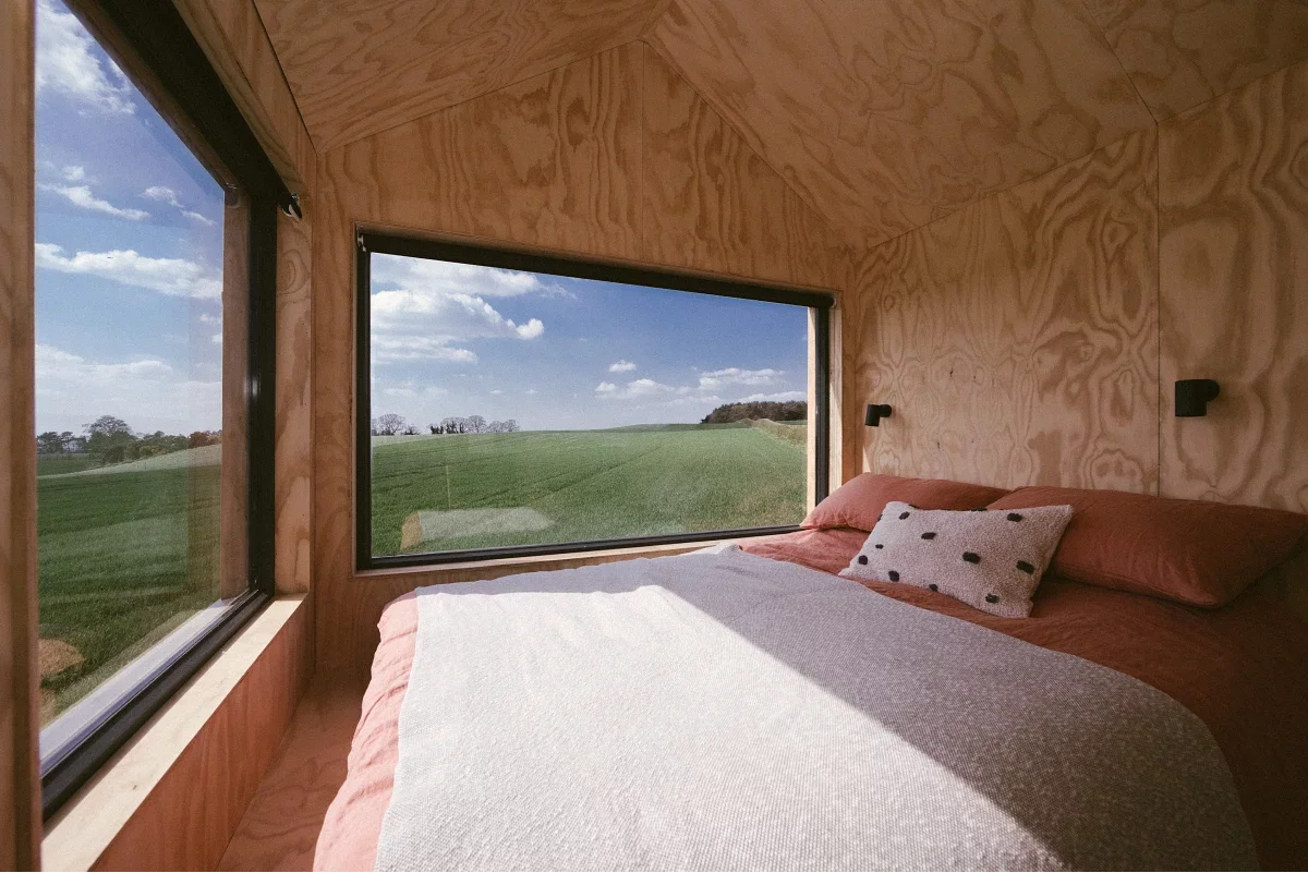 Panoramic windows inside Unplugged's Peggy cabin