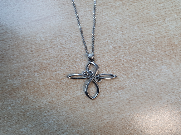 The necklace the woman was wearing when she was found at East Didsbury station, released as part of the appeal to identify her. 