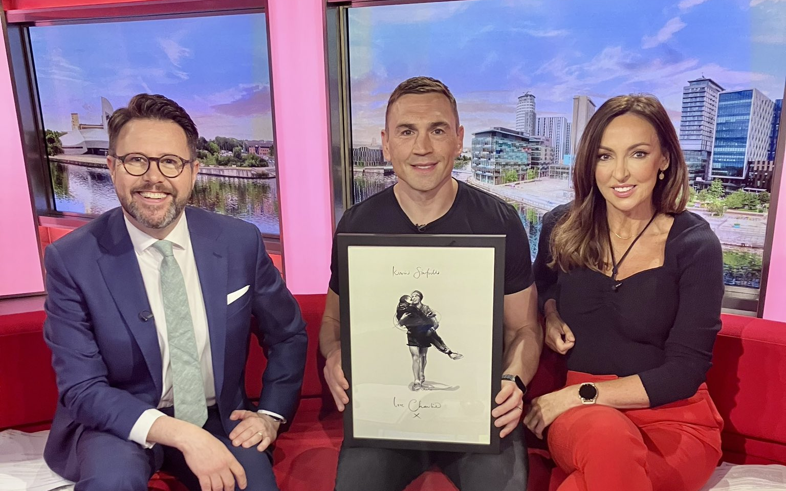 Kevin Sinfield given artwork of him carrying Rob Burrow over the finish line Leeds Marathon