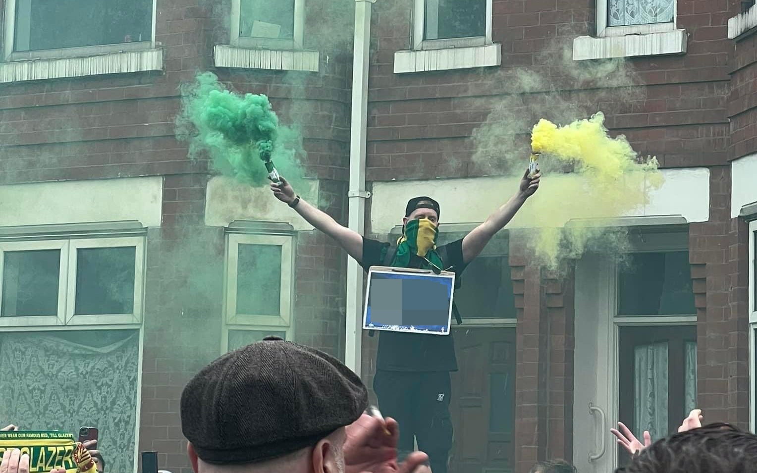 Man United protester funny Glazers Out VAR Sign