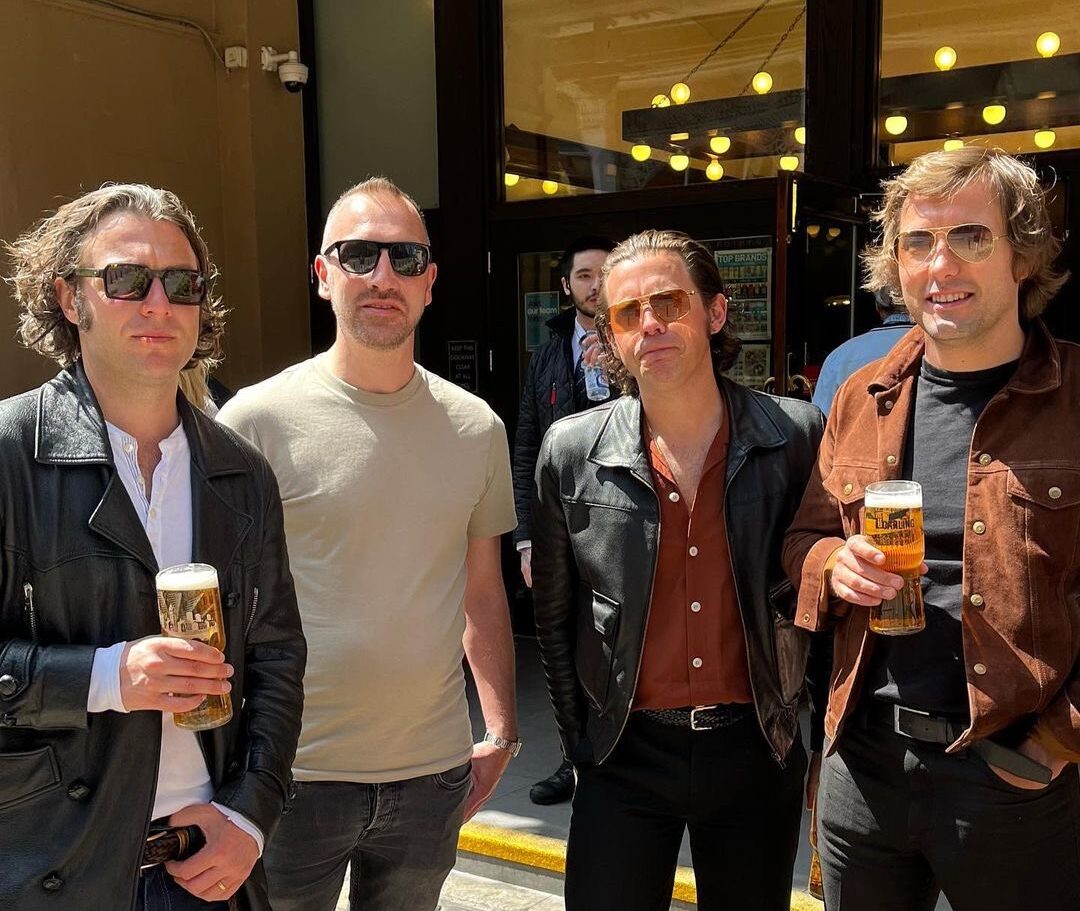 Arctic Monkeys outside a Wetherspoons pub in Manchester.