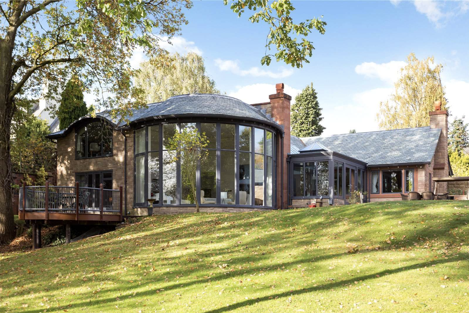 The rear of the Altrincham house with its own hobbit house.