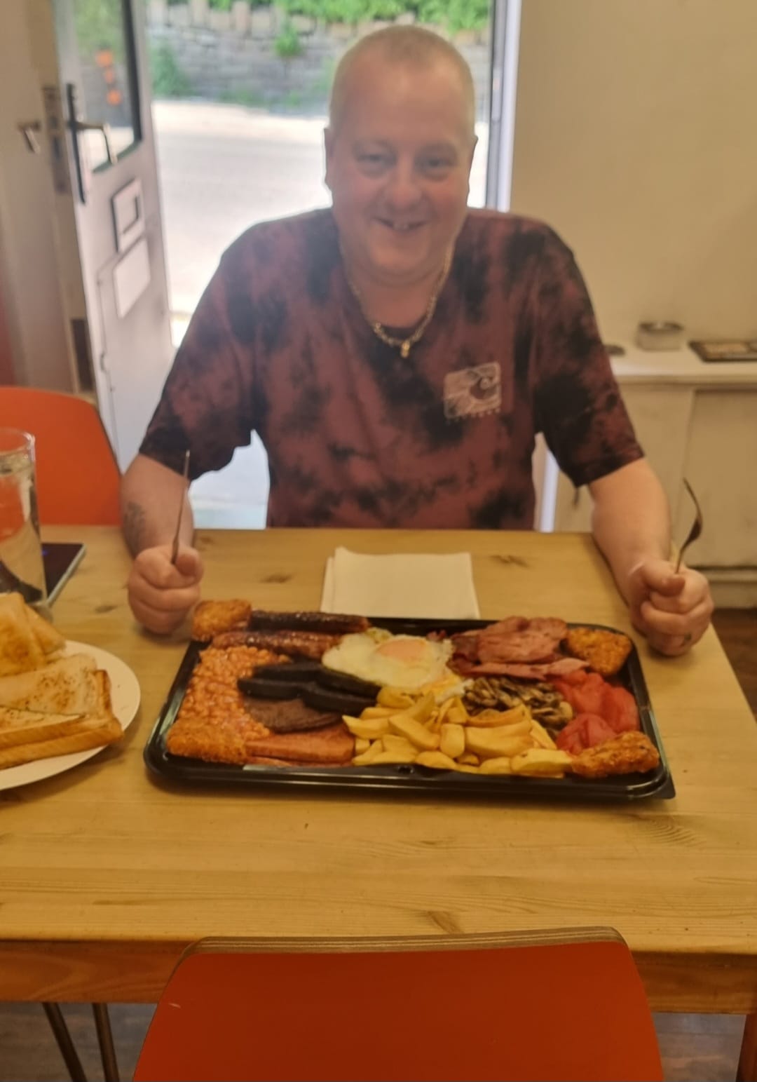A customer in Bury trying the full english challenge