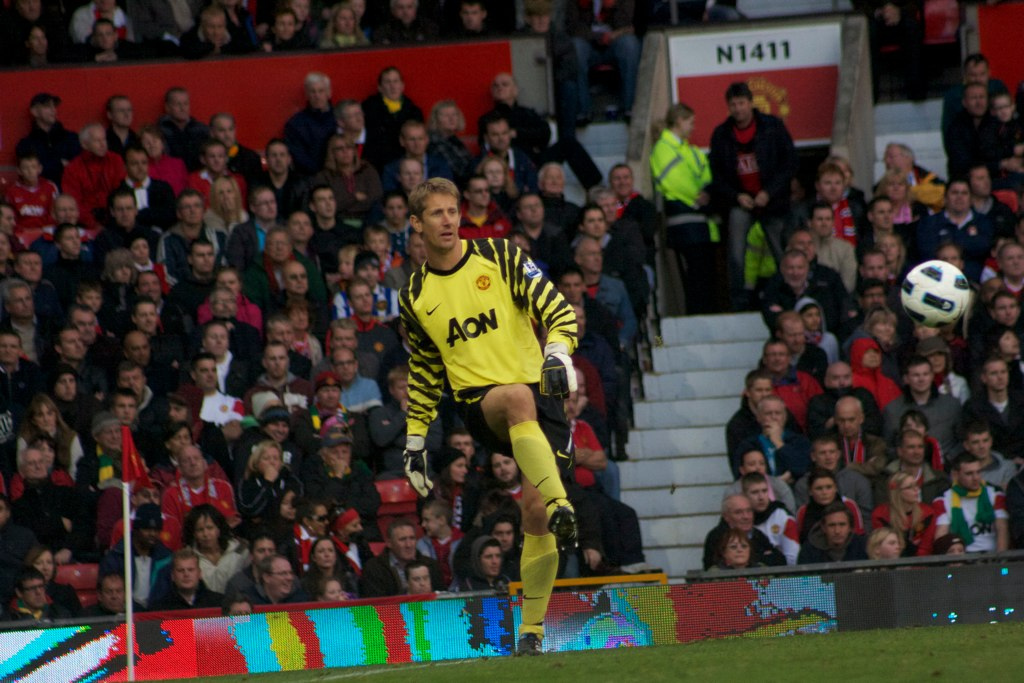 Edwin van der Sar in his time playing for Manchester United - he has been rushed to hospital after suffering a brain haemorrhage