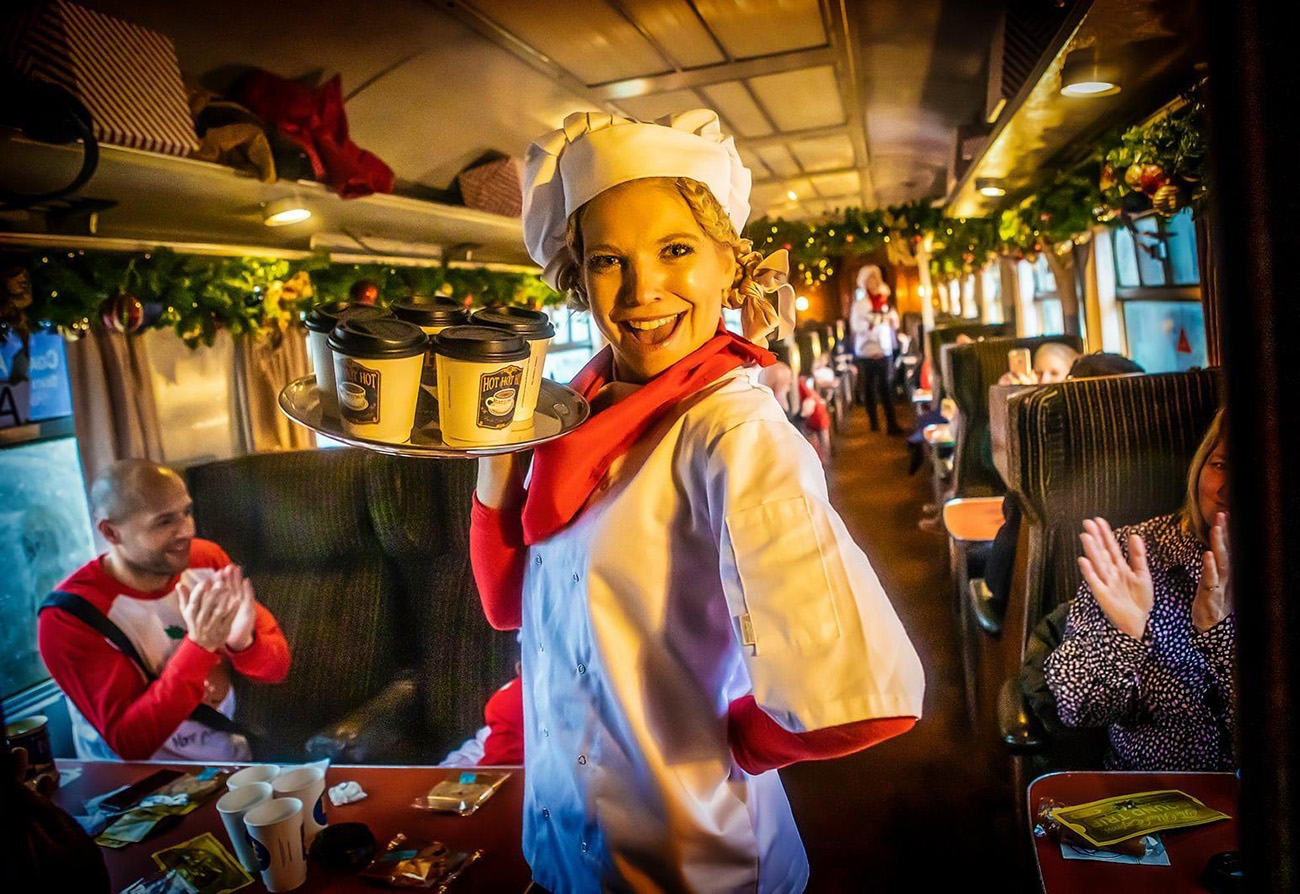 Actors on board The Polar Express Train Ride experience