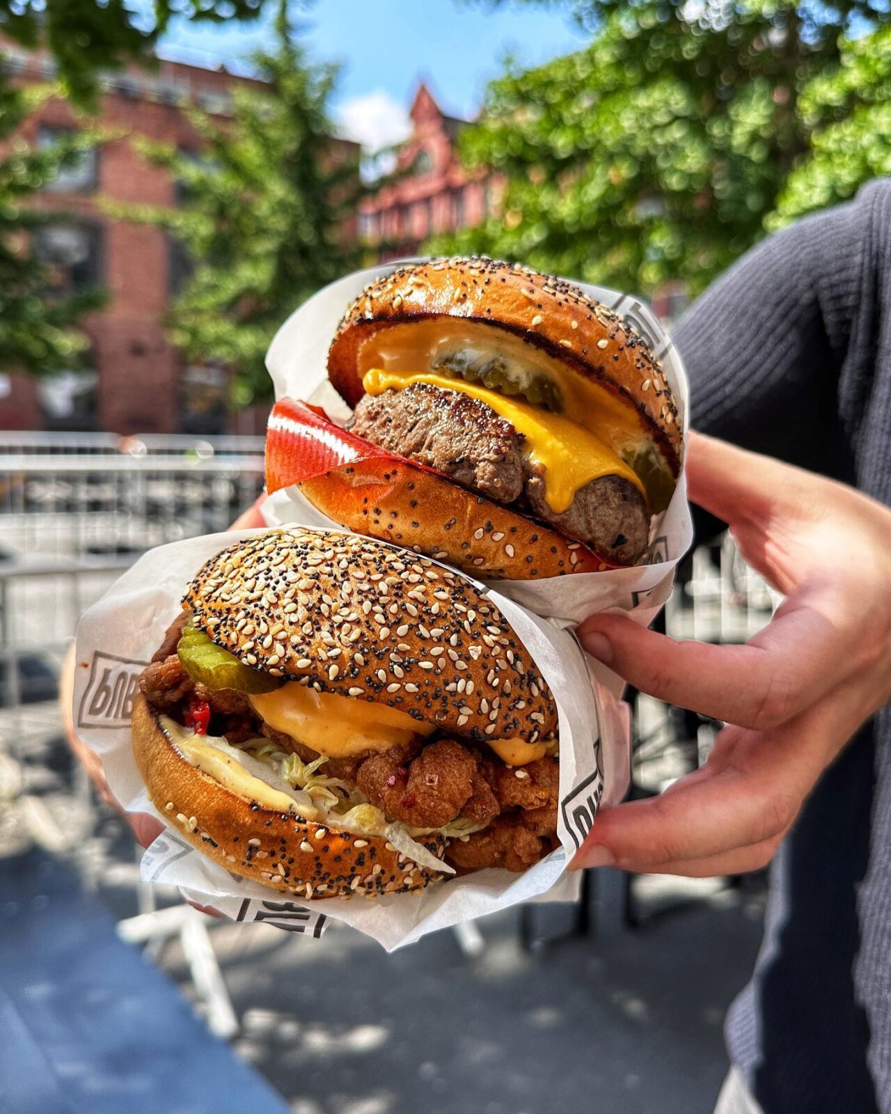 Burger and chicken sando at Public, a new bar on Stevenson Square.