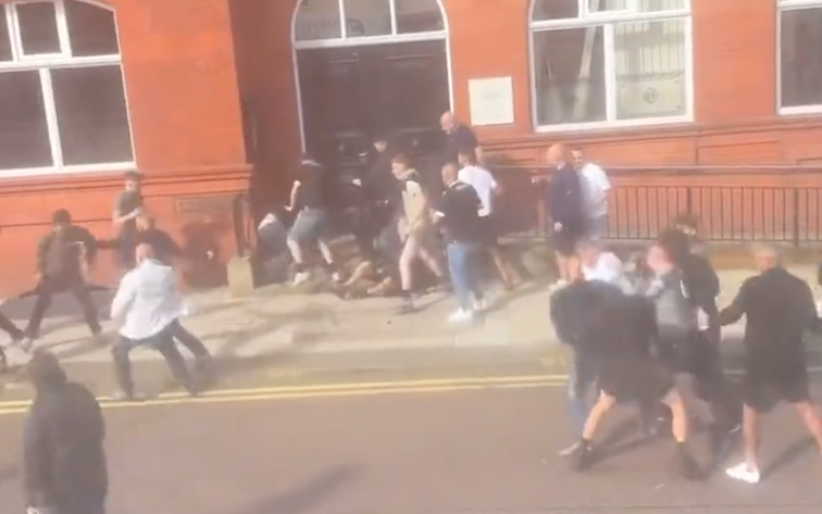 Bolton and Wigan fans fight after derby day