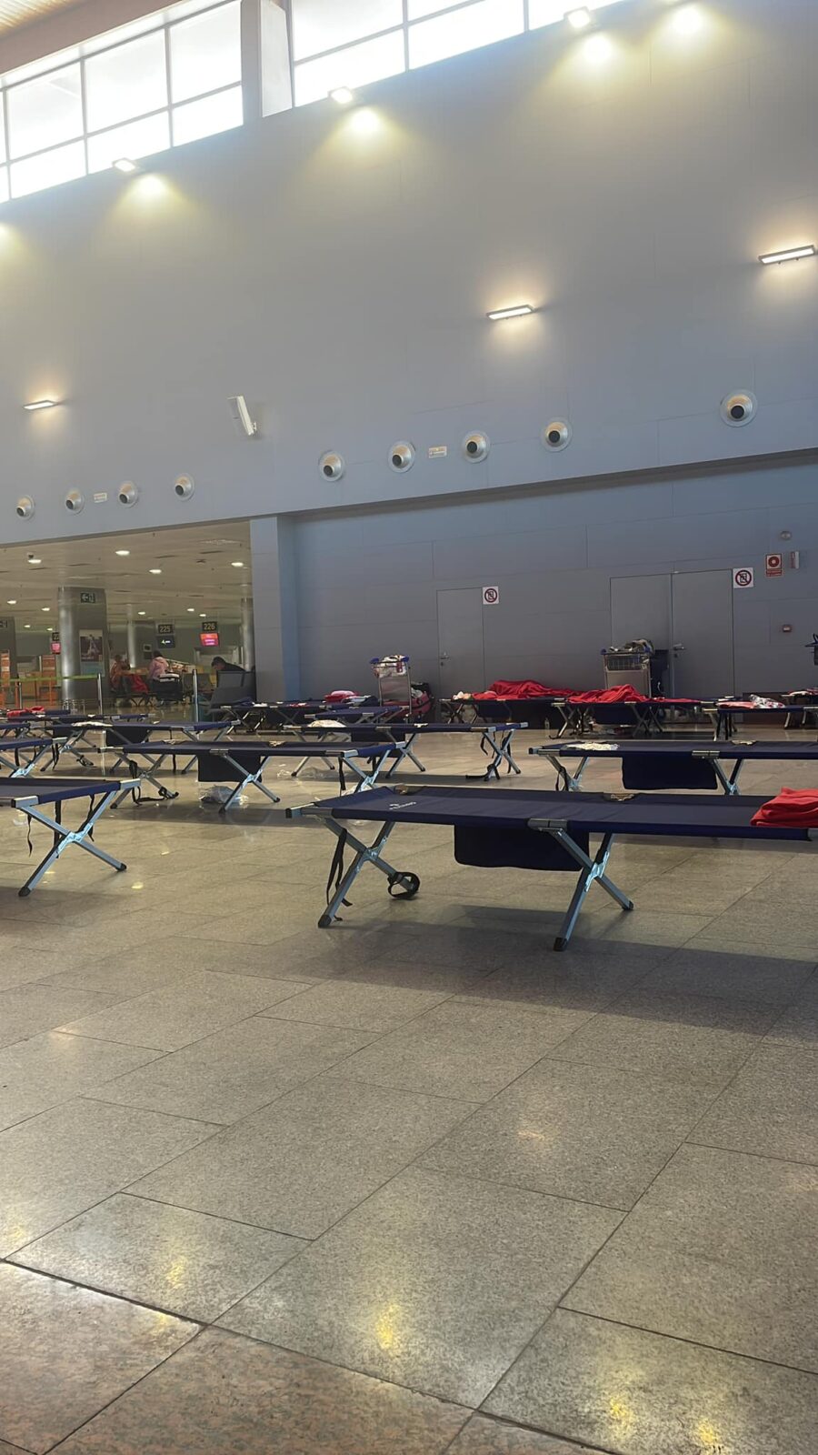 military camp beds airports flight chaos
