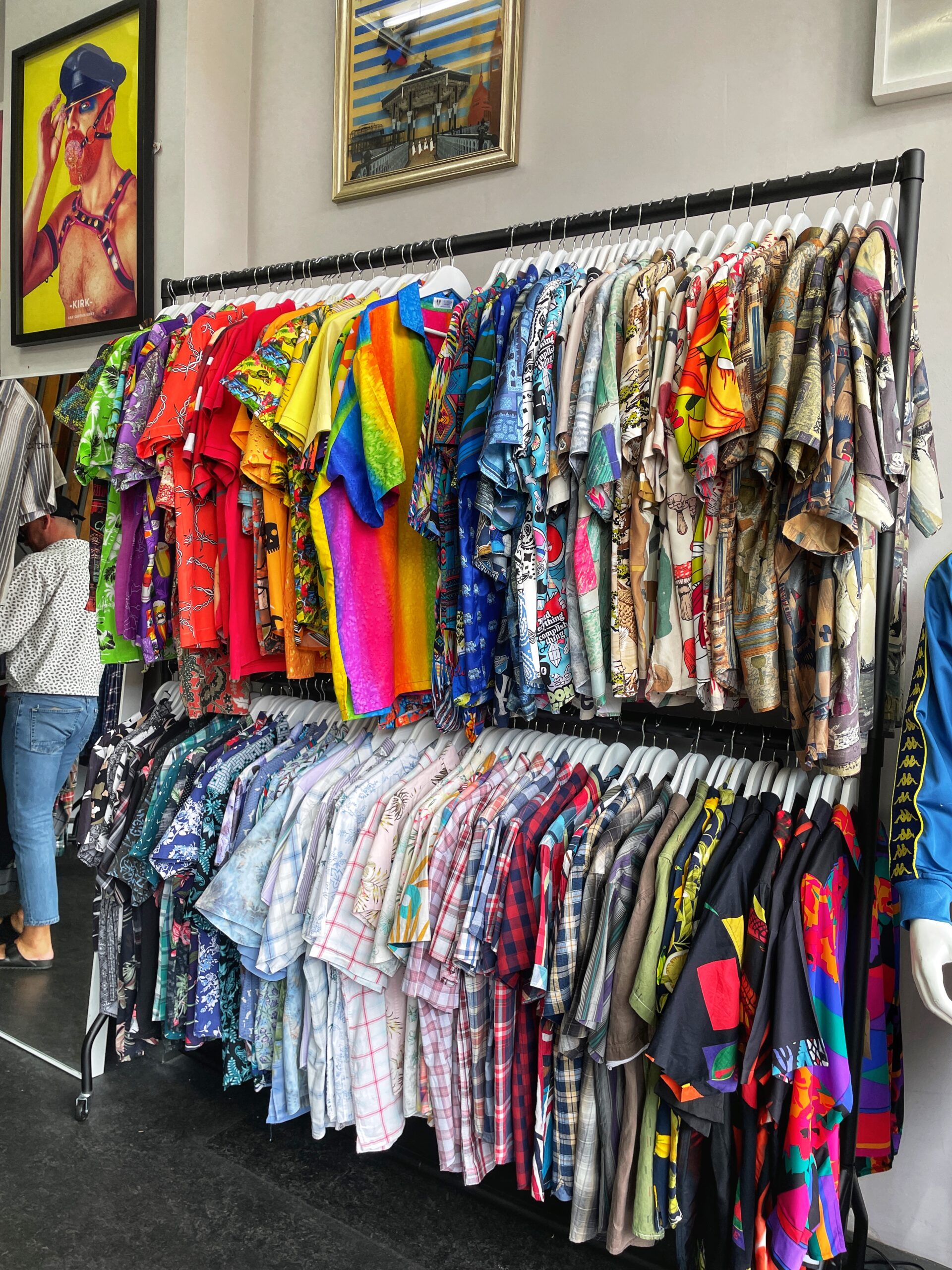 A wall of brightly-coloured vintage shirts at Catch My Thrift, Manchester. Credit; The Manc Group