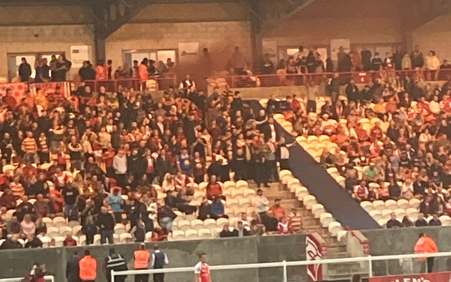 Salford Red Devils fans flares throwing beers two arrests Hull KR