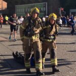 Firefighters run Manchester half marathon in full gear and drag drummy