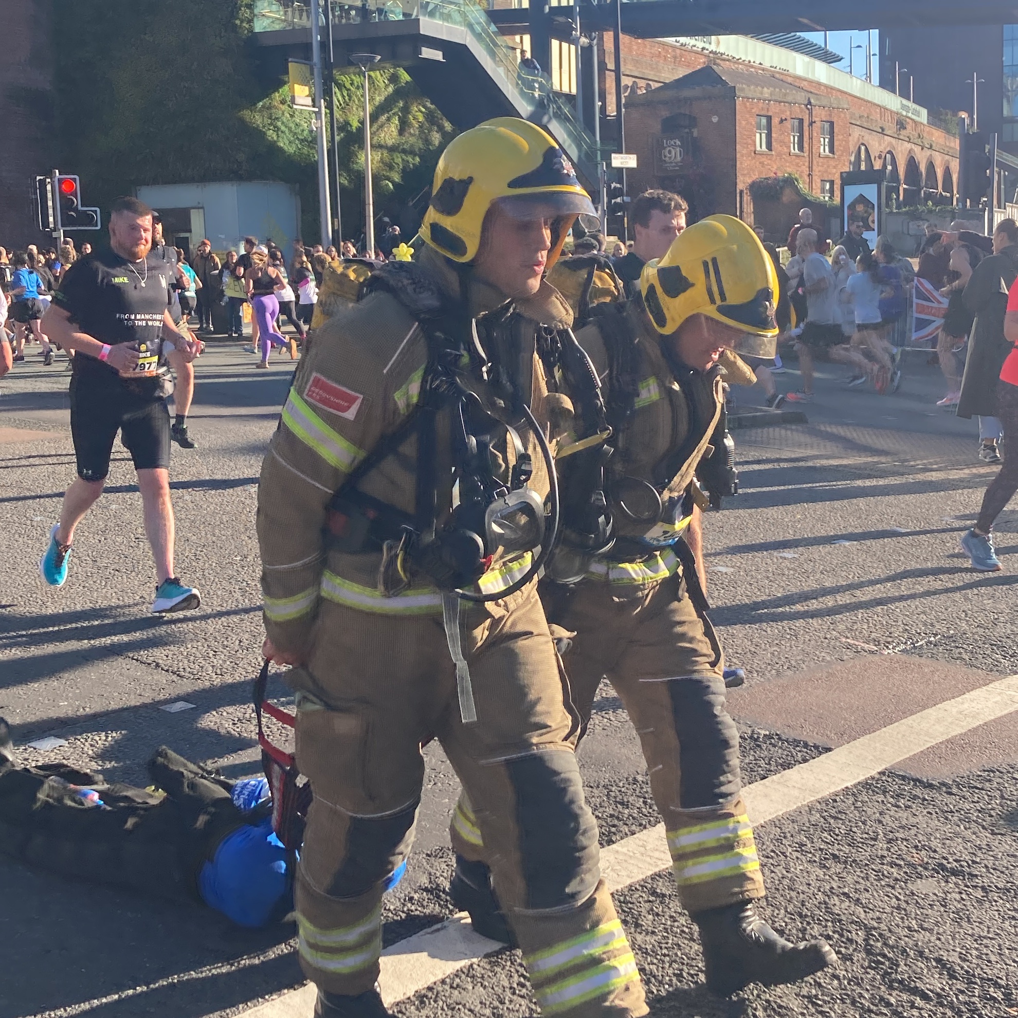 greater manchester firefighters run half marathon in full gear