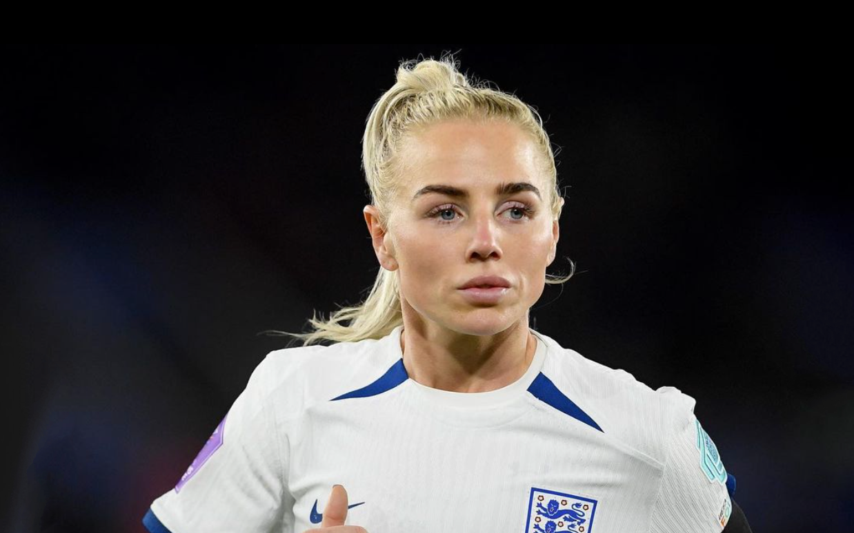 Alex Greenwood awake talking after head clash