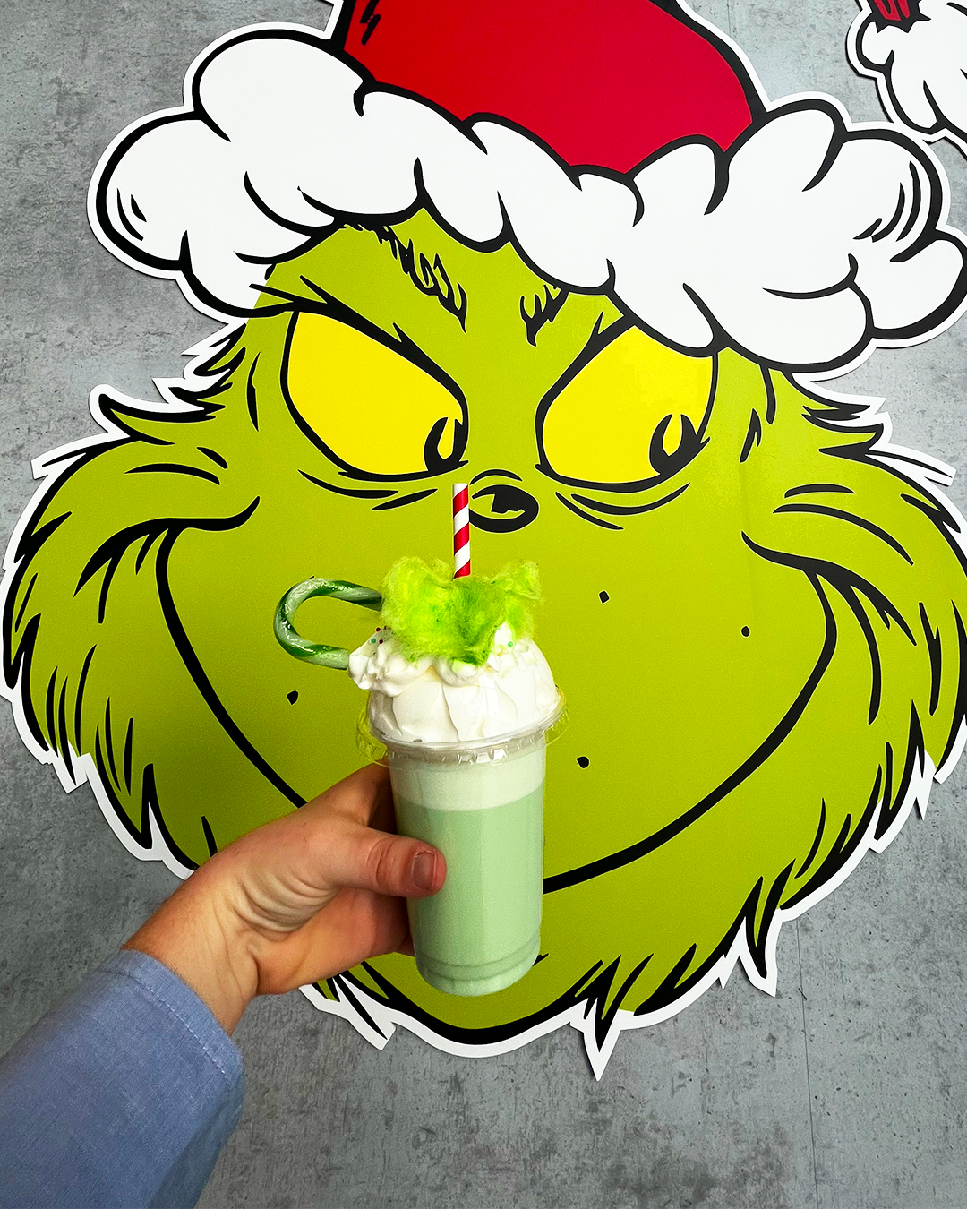 A Grinch-themed cafe has opened in a Greater Manchester Primark