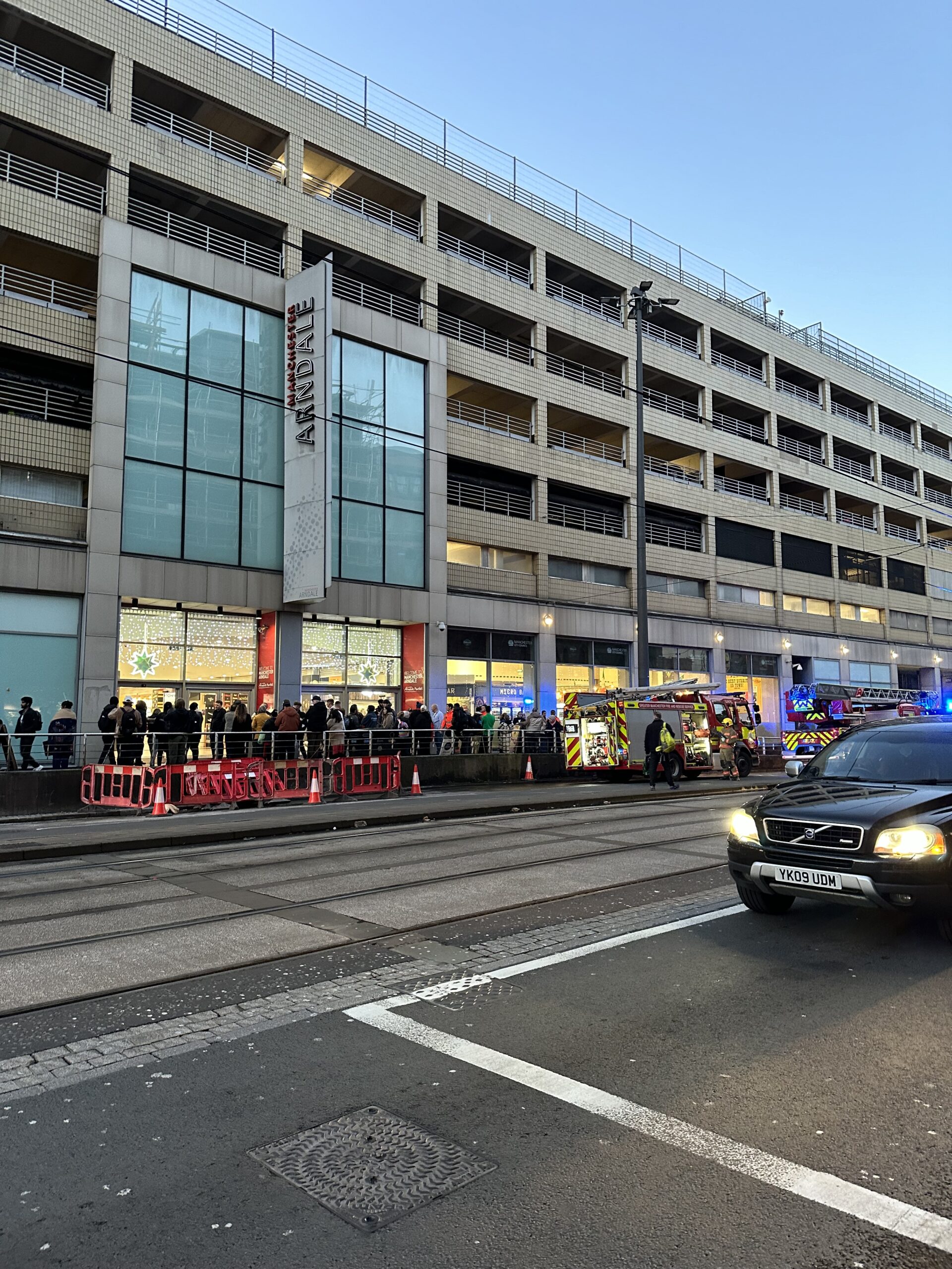 Shoppers evacuated from the Arndale Market in Manchester after a fire set off the sprinkler system