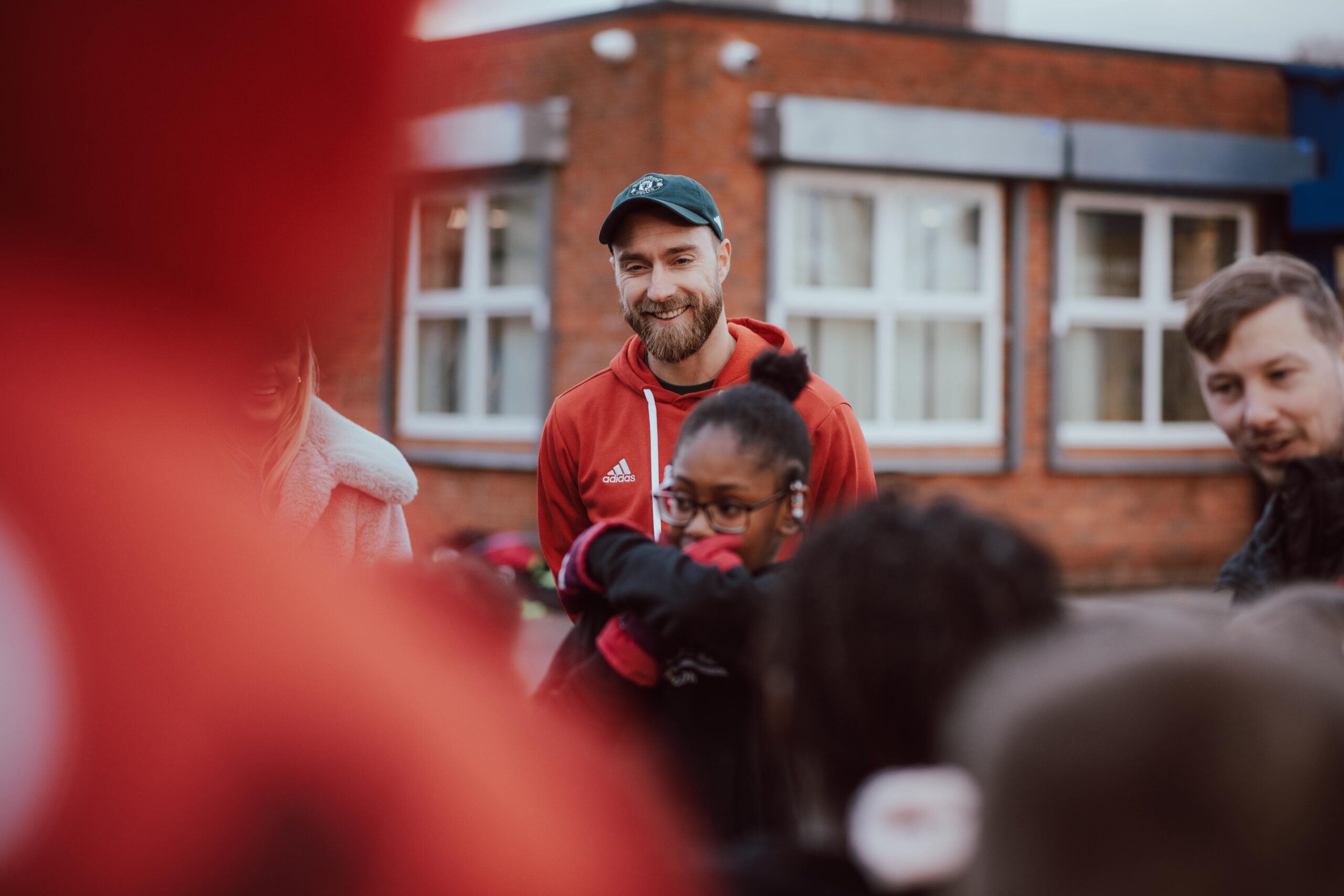 Christian Eriksen makes surprise visit to Old Trafford primary school