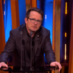Michael J Fox receives standing ovation as he gets up out of his wheelchair at the 2024 BAFTAs