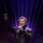 Manchester City will be aiming for a new Premier League title on Sunday while Barry Manilow plays next door