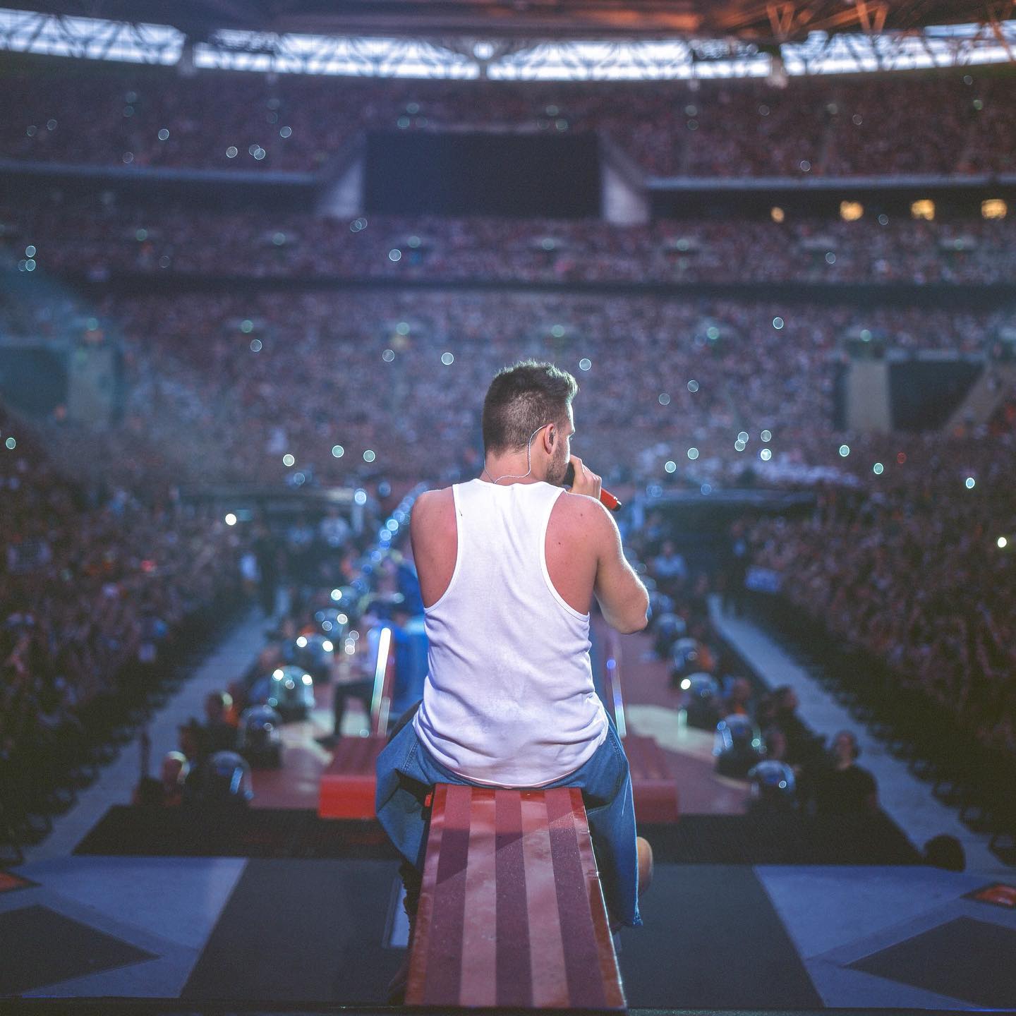 Harry Styles shared a photo of Liam Payne on stage with his tribute. Credit: Instagram, @harrystyles