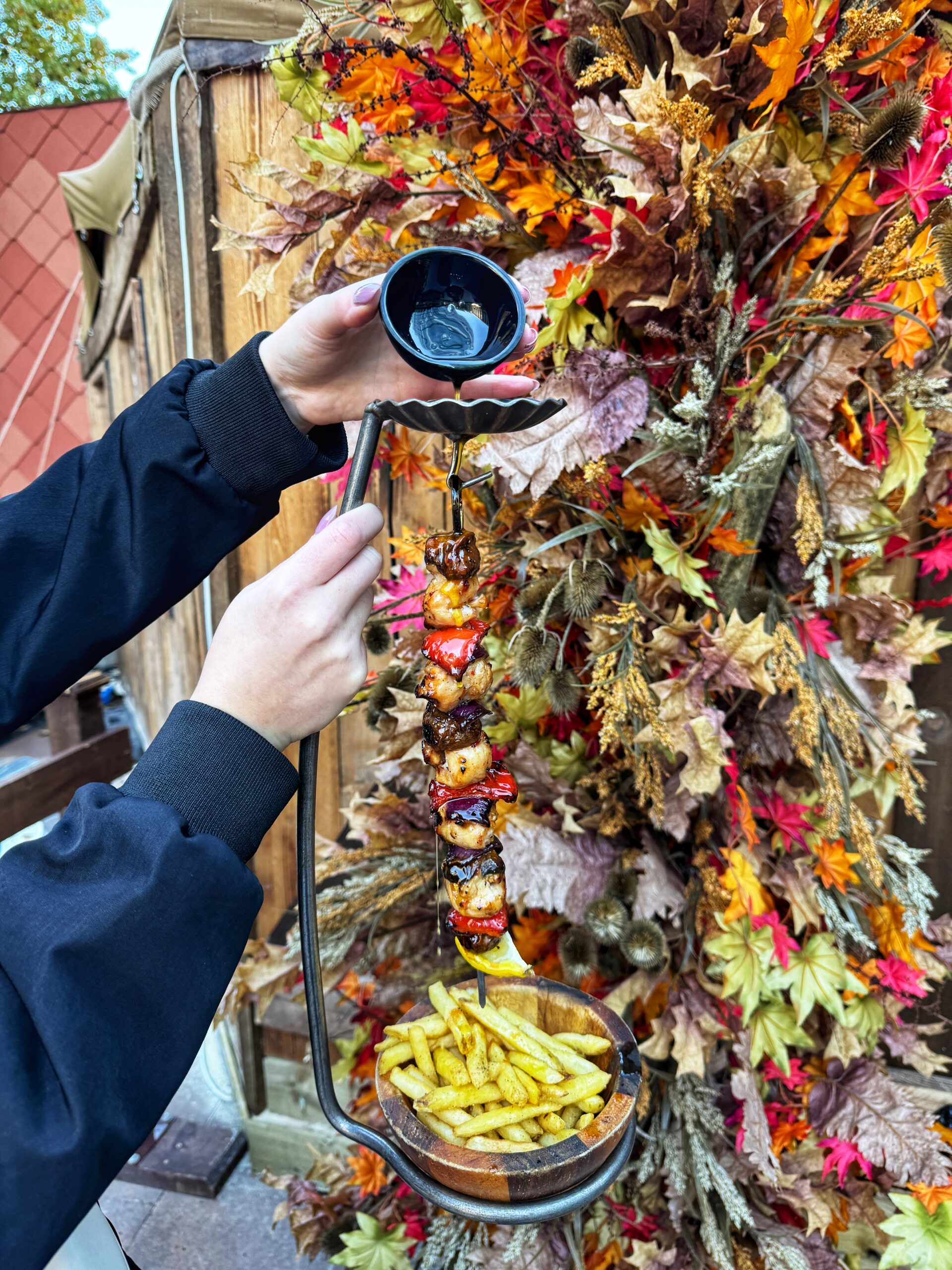 Hanging kebabs at The Oast House's winter teepee