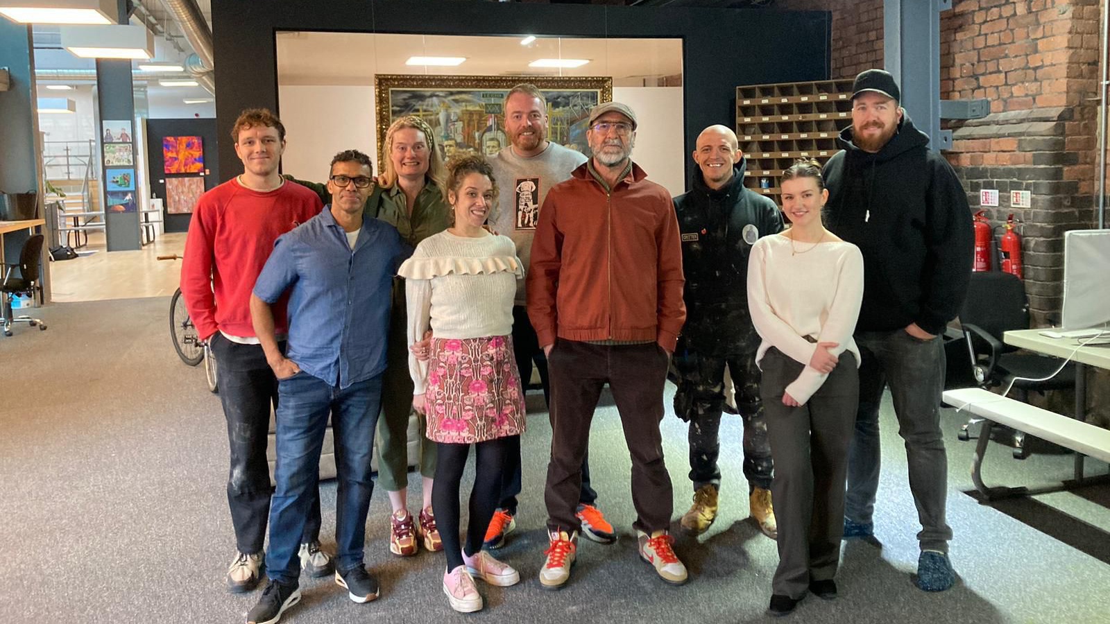 Eric Cantona surprises Manchester artists at GRIT Studios