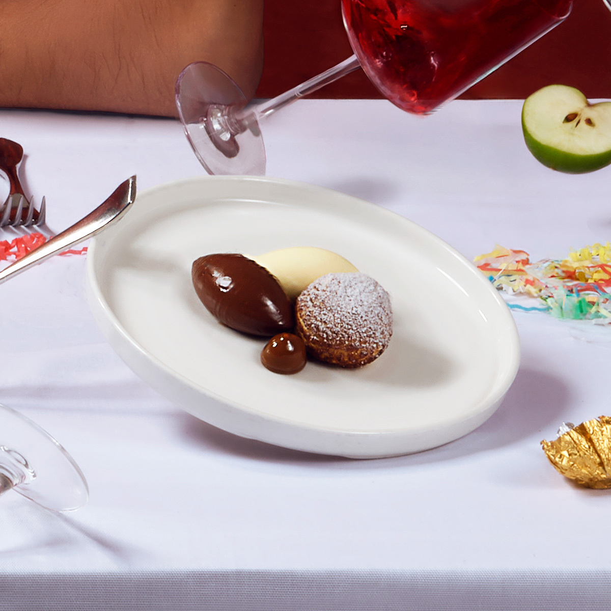 Chocolate Profiteroles, Tahitian vanilla Choux au Craquelin, chocolate Cremeux, buttermilk sorbet and dulce de leche on the Six By Nico festive roast menu. Credit: Supplied