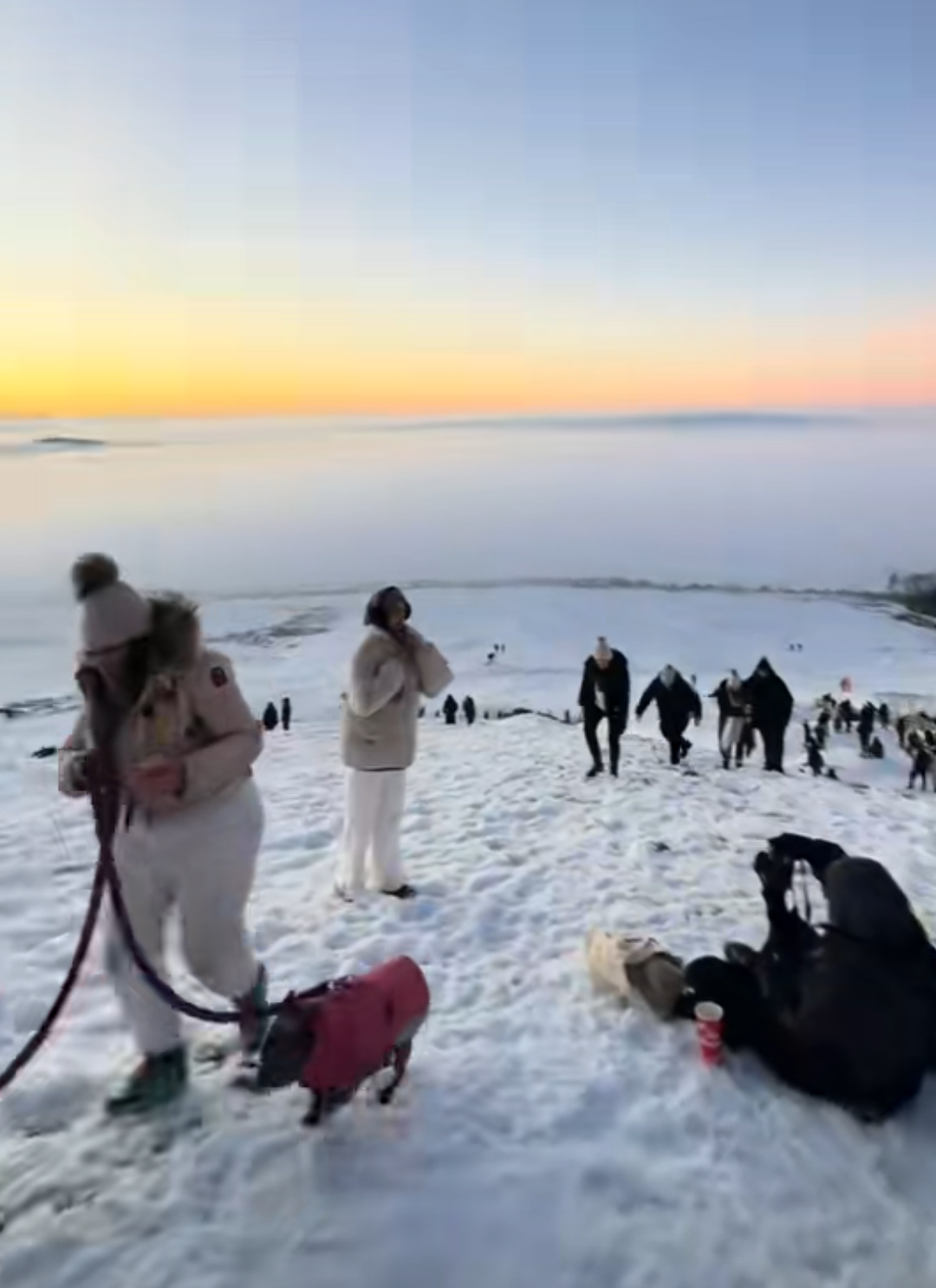 Crowds at the top of Mam Tor in the Peak District at sunrise. Credit: TikTok, mum.life.travels