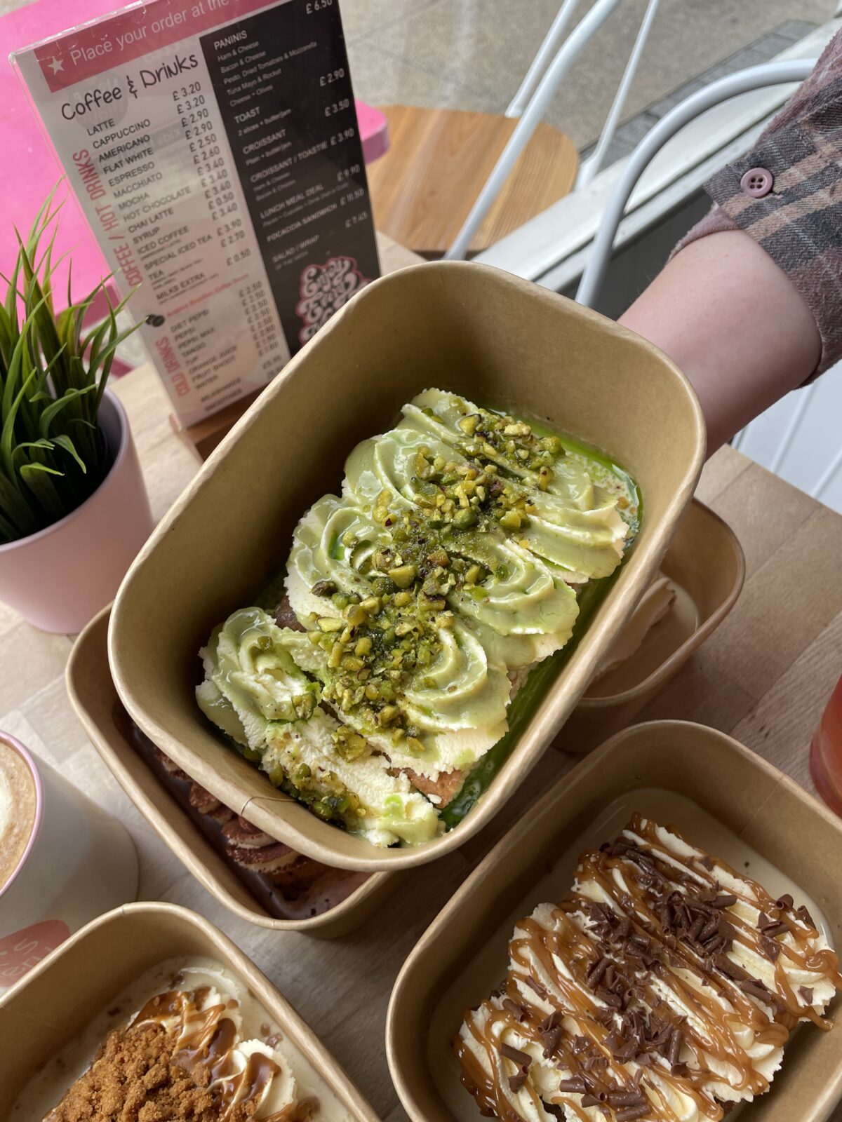 You can get pistachio tres leche cake at Alex's Bakery