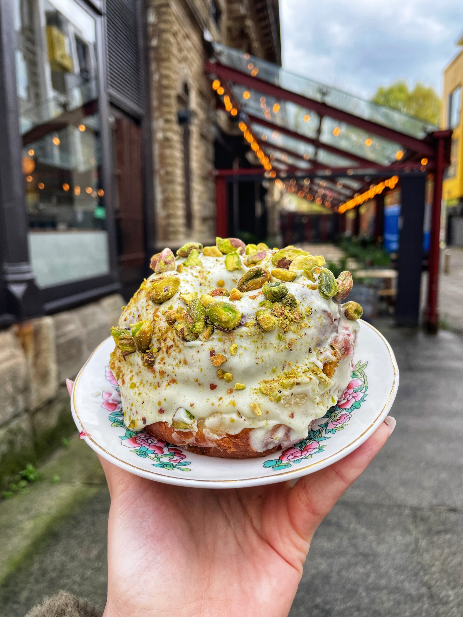 DGHNT's pistachio tiramisu doughnut in Mackie Mayor, Manchester