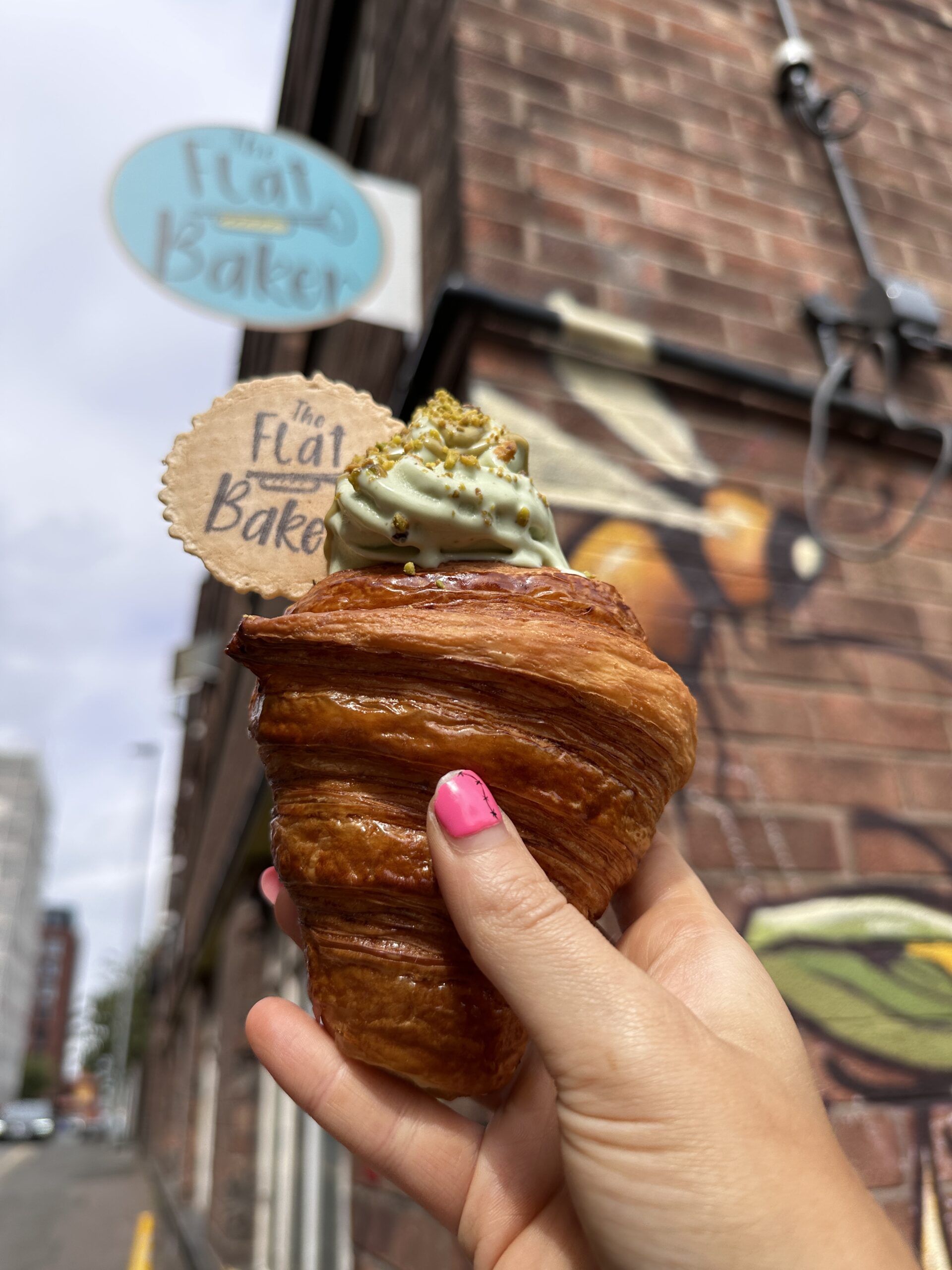 Pistachio soft serve in a croissant from Flat Baker