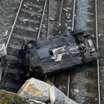 Train delays after car crashes on Manchester to Liverpool railway line in Salford