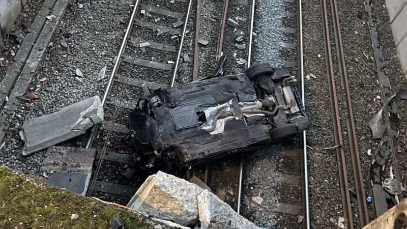 Train delays after car crashes on Manchester to Liverpool railway line in Salford