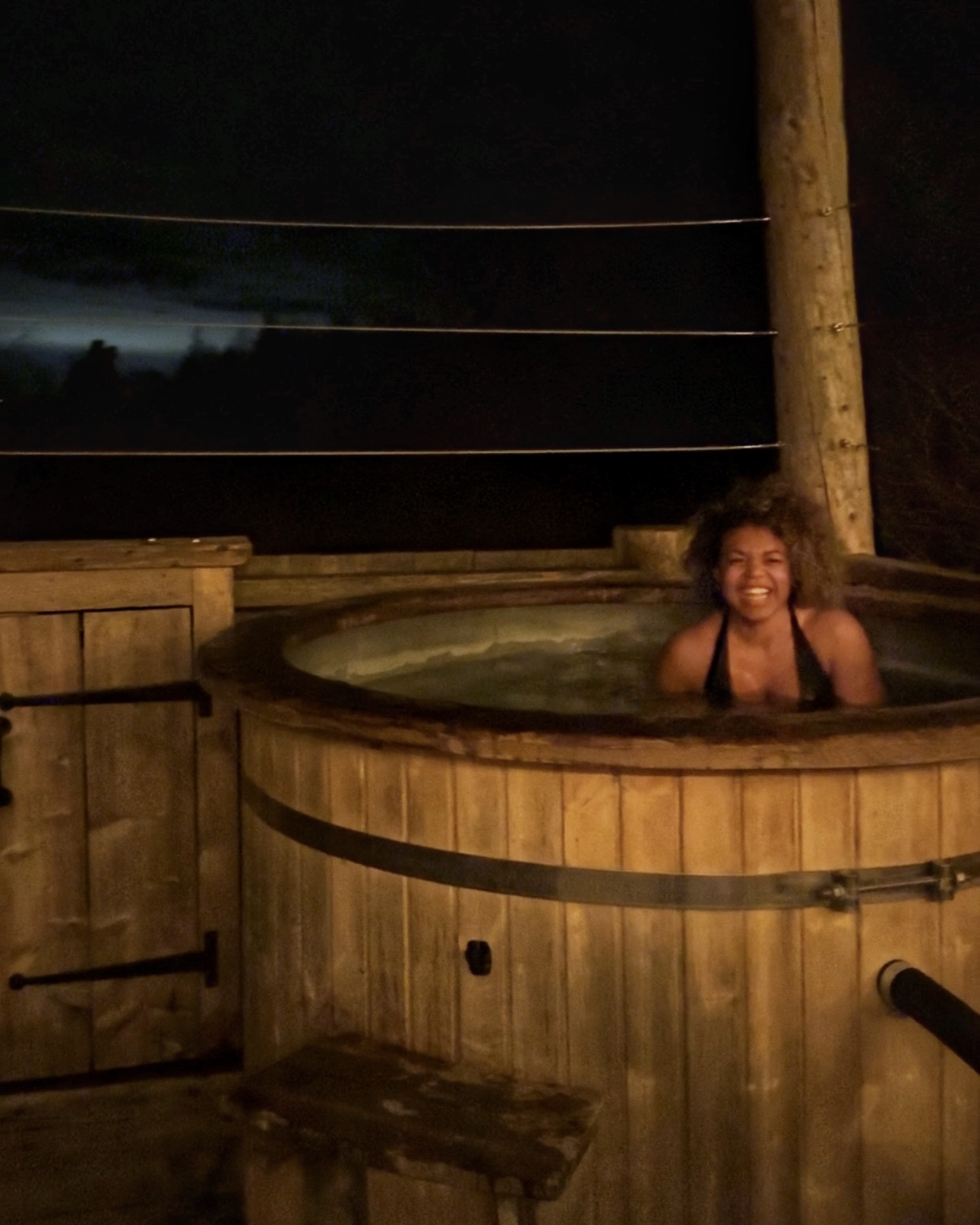 The wood-fired hot tub in action