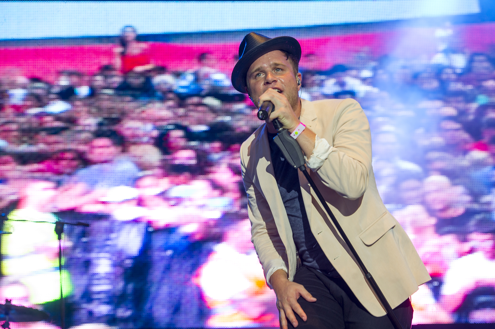 Olly Murs sporting his usual blazer and top-hat style back in 2013.
