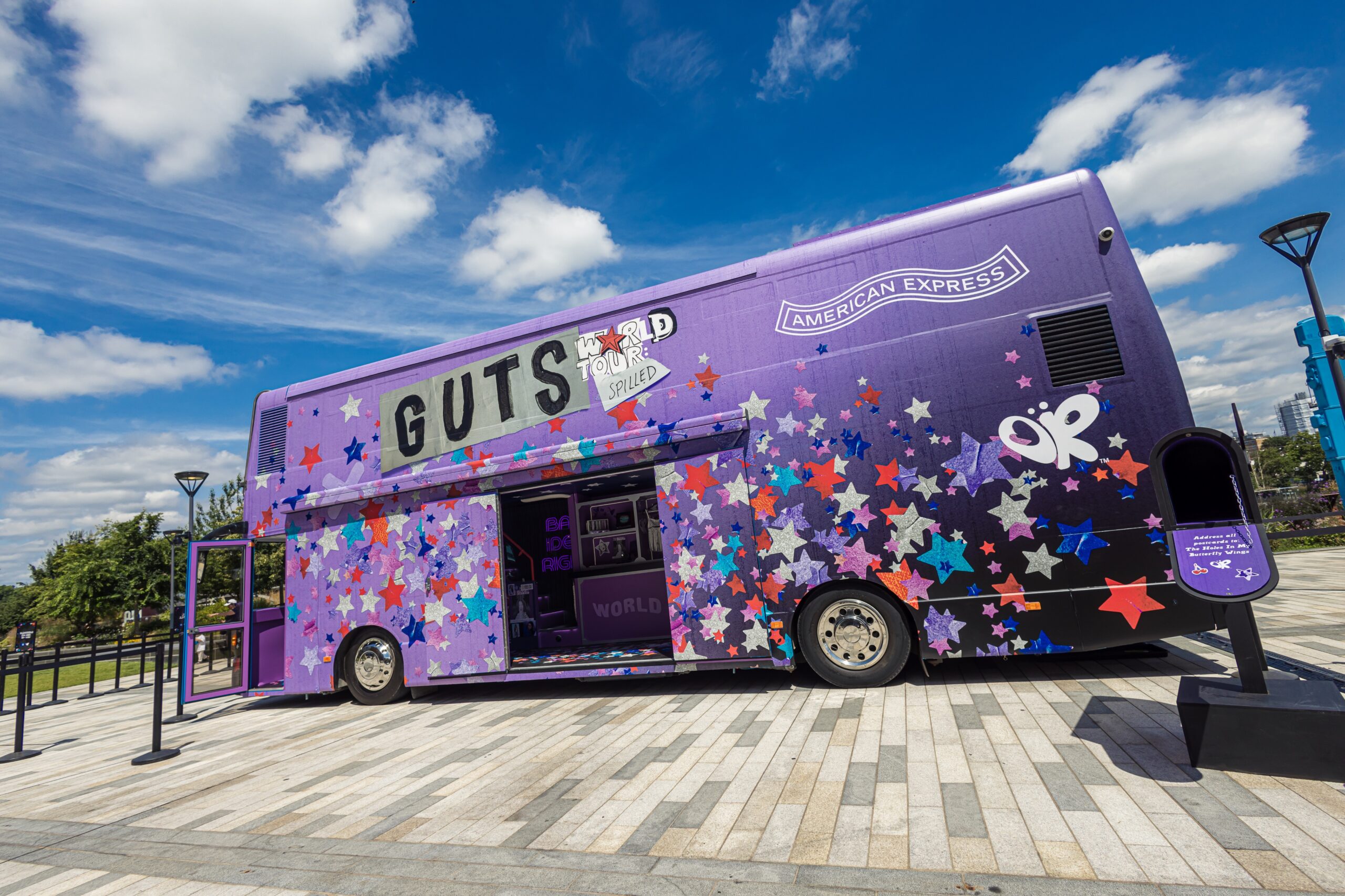 This big purple 'GUTS Bus'  will be waiting outside Co-op Live throughout Olivia's Manchester shows.