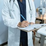 Doctor checking medical records